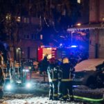 Firemen at work near their truck on the street e1714846742589 150x150